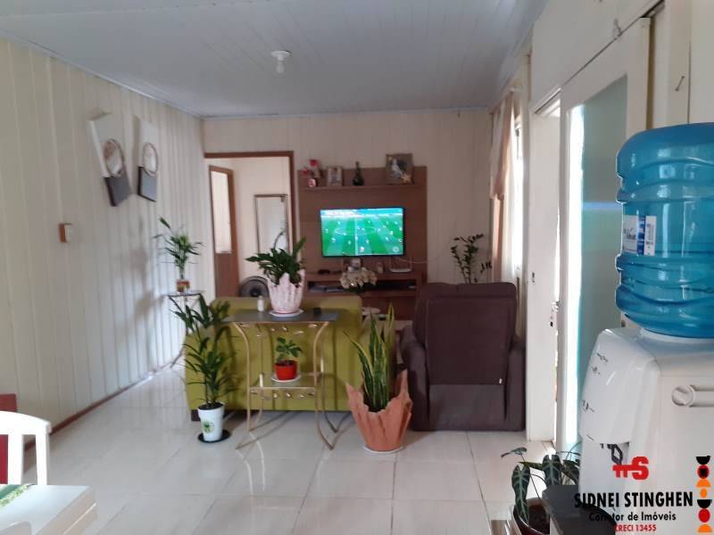 Casa à venda com 3 quartos, 100m² - Foto 4